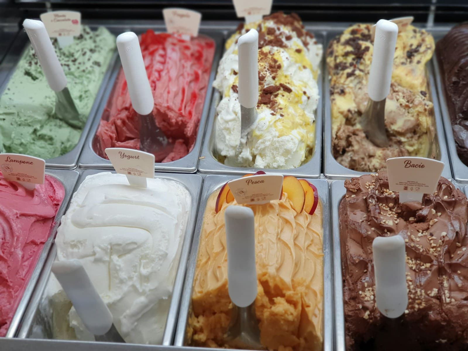 Trays of gelato in a shop display