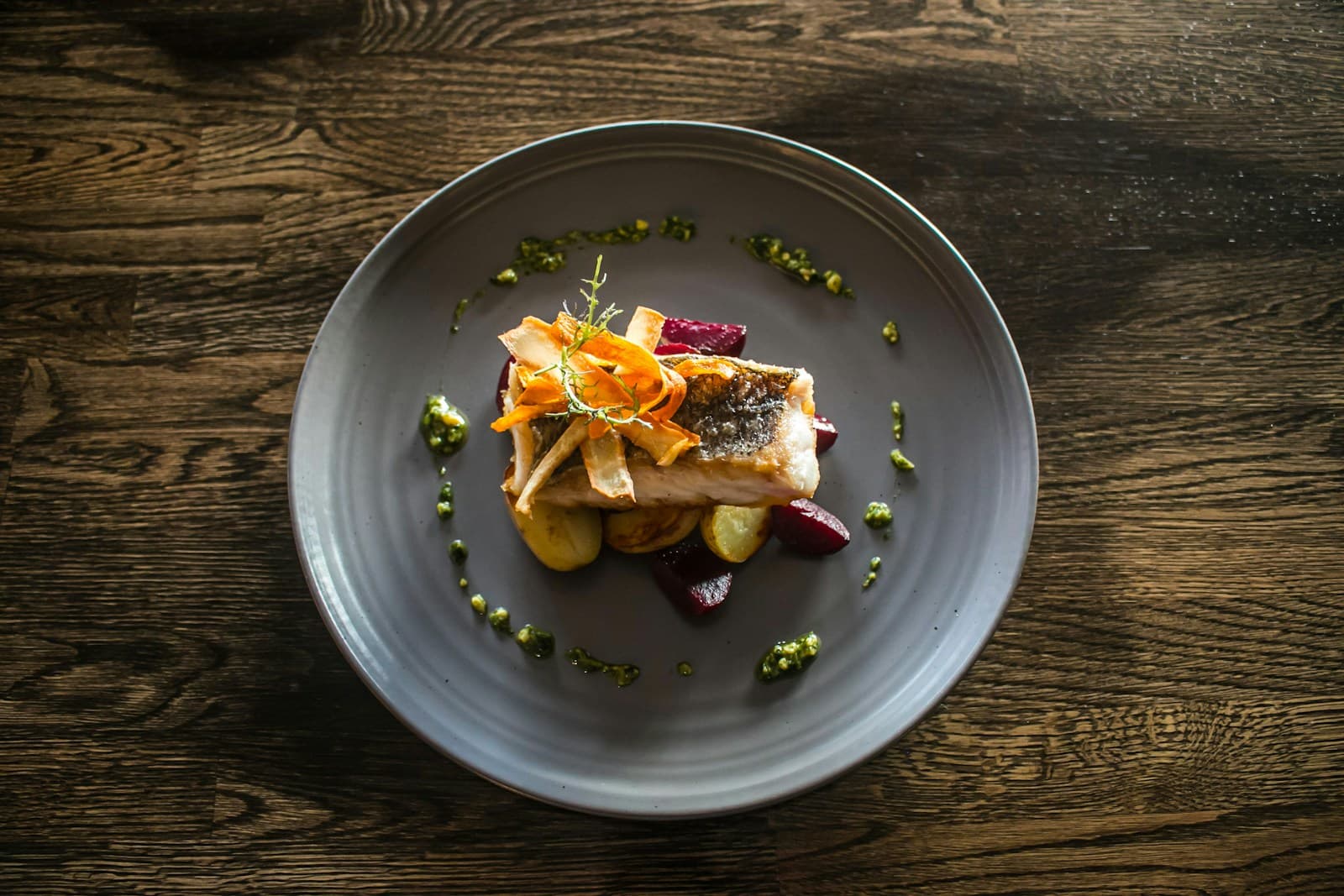 Pan-seared fish with potatoes and beets